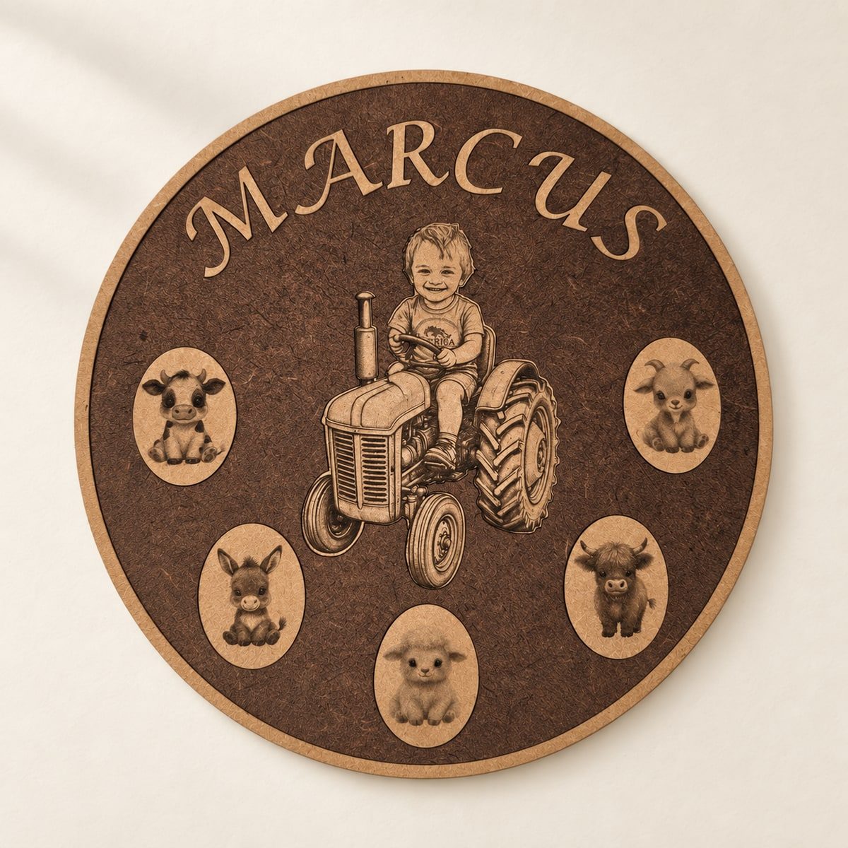 Round wooden Marcus plaque with a child on a tractor and five animal medallions.