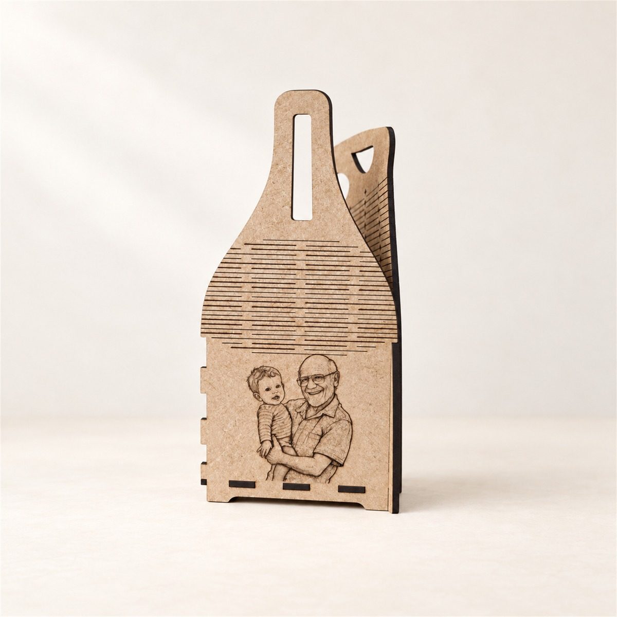 Wooden wine carrier engraved with a photograph of a grandfather holding a baby.